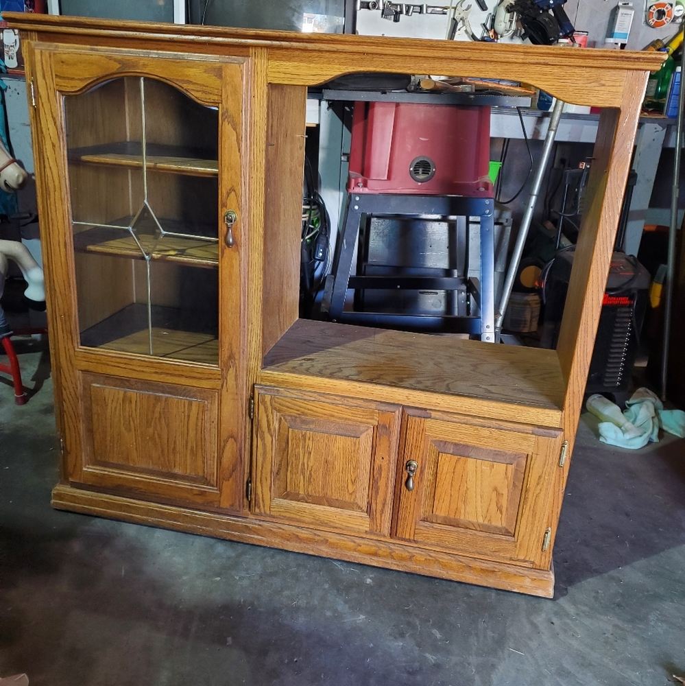 Medium size intertainment center in really good condition.